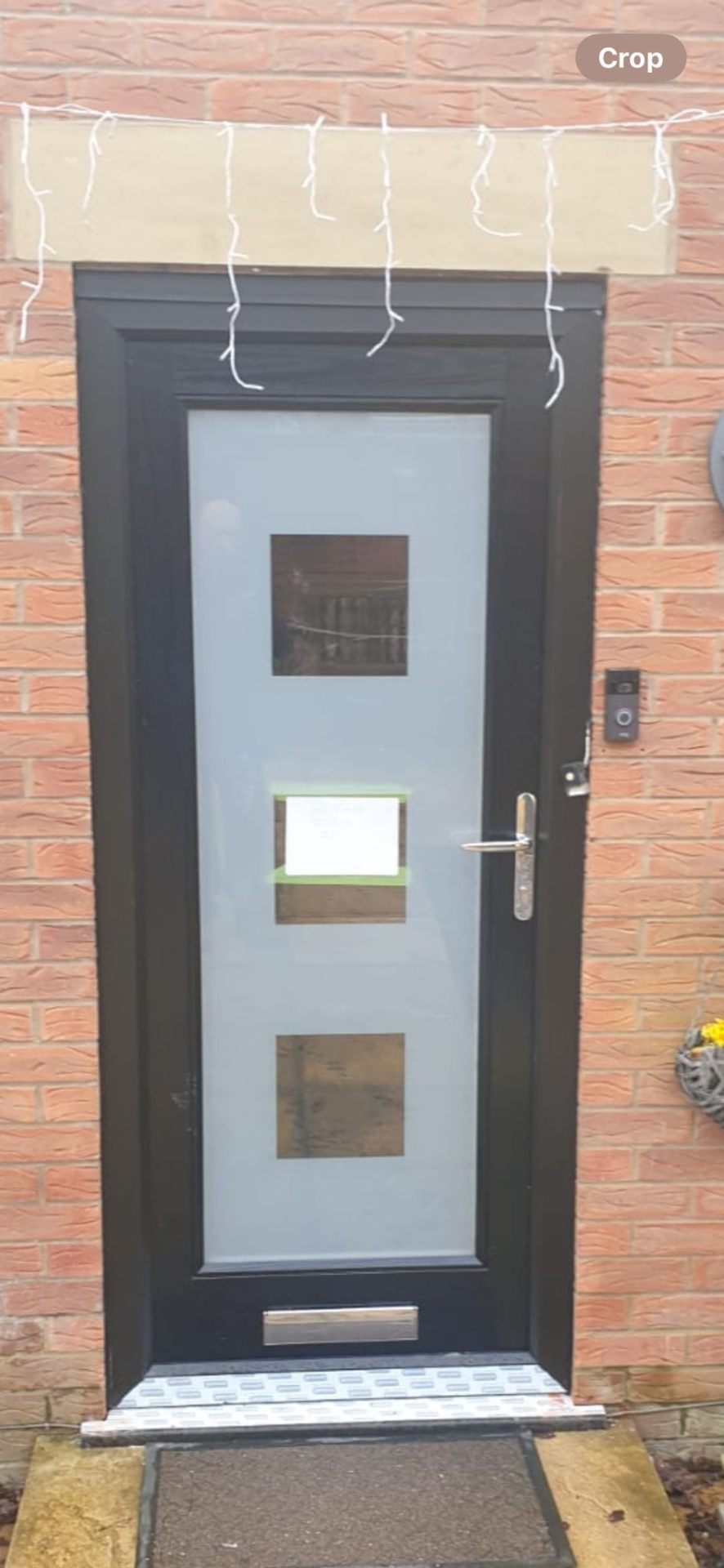 Grey composite door with three-pane frosted glass design